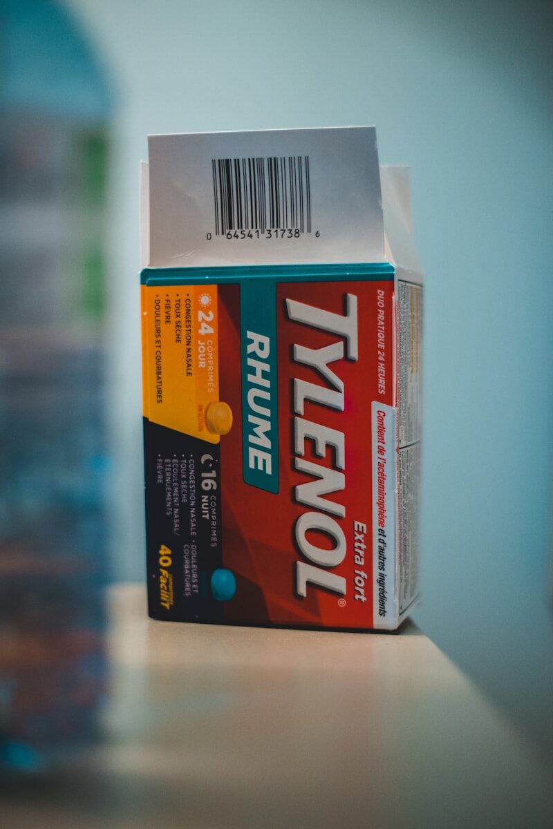 Photo by Erik Mclean a box of vitamin pills sitting on top of a table